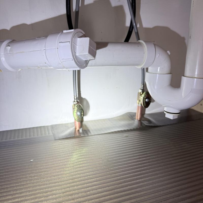 Faucet shut-off valves and PVC drain piping installation Faucet shut-off valves and PVC drain piping installation