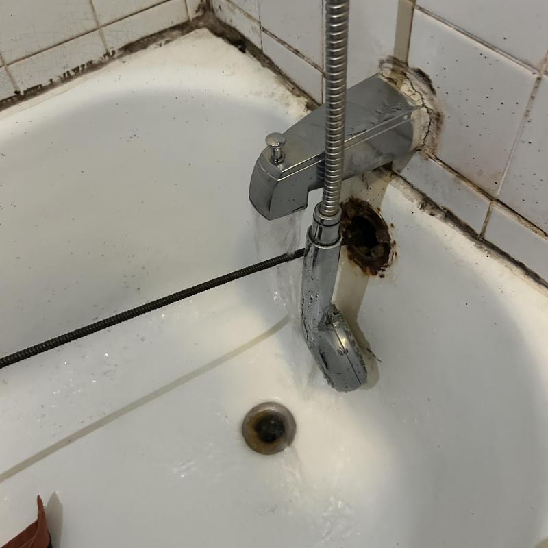 Bathtub faucet and shower hose with rust and mold Bathtub faucet and shower hose with rust and mold