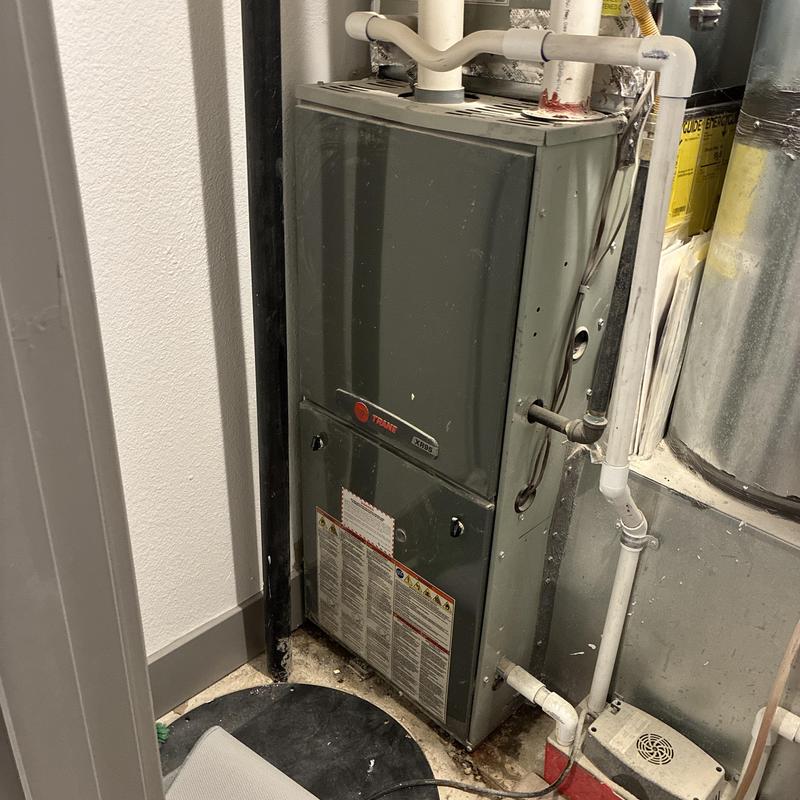 Ruud gas furnace with PVC vent pipes installed Ruud gas furnace with PVC vent pipes installed