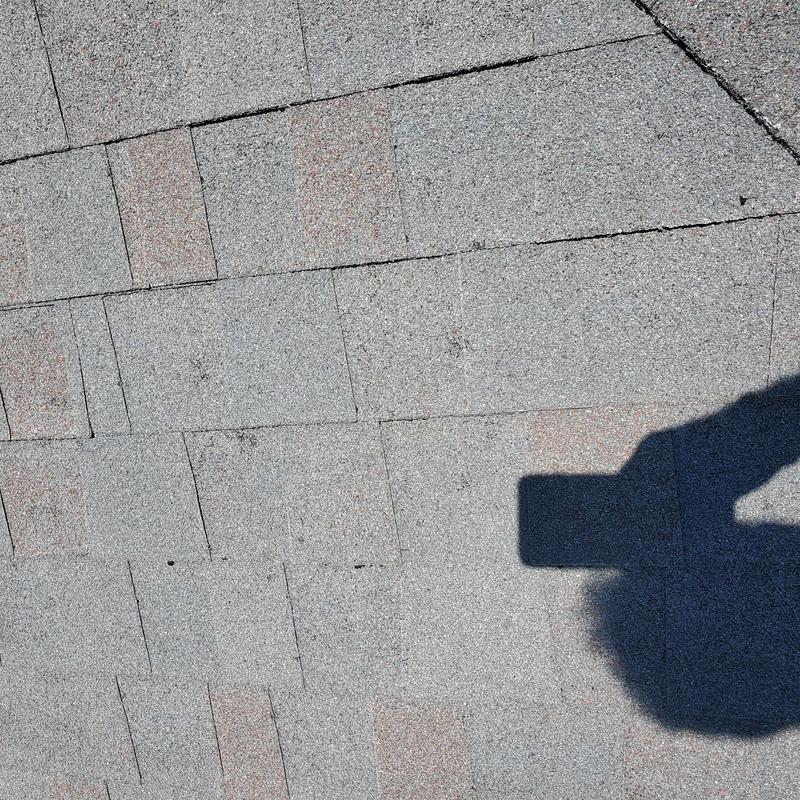 Asphalt shingle roof with minor hail damage in Terrell TX