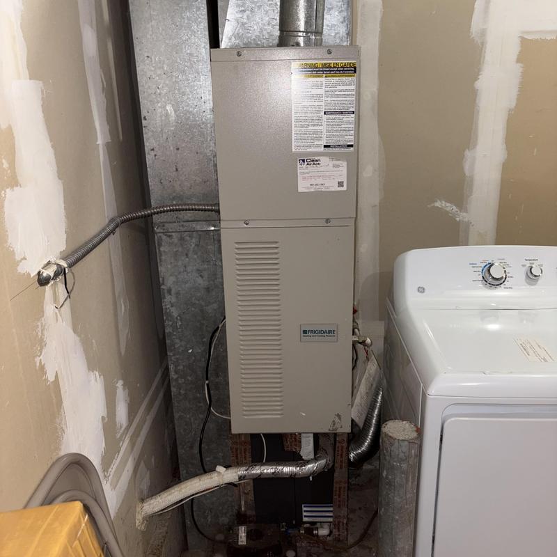 Frigidaire gas furnace with ductwork in utility room Frigidaire gas furnace with ductwork in utility room