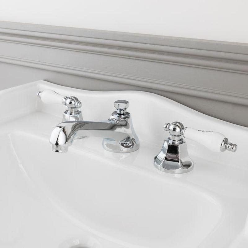 Bathroom basin faucet with chrome handles