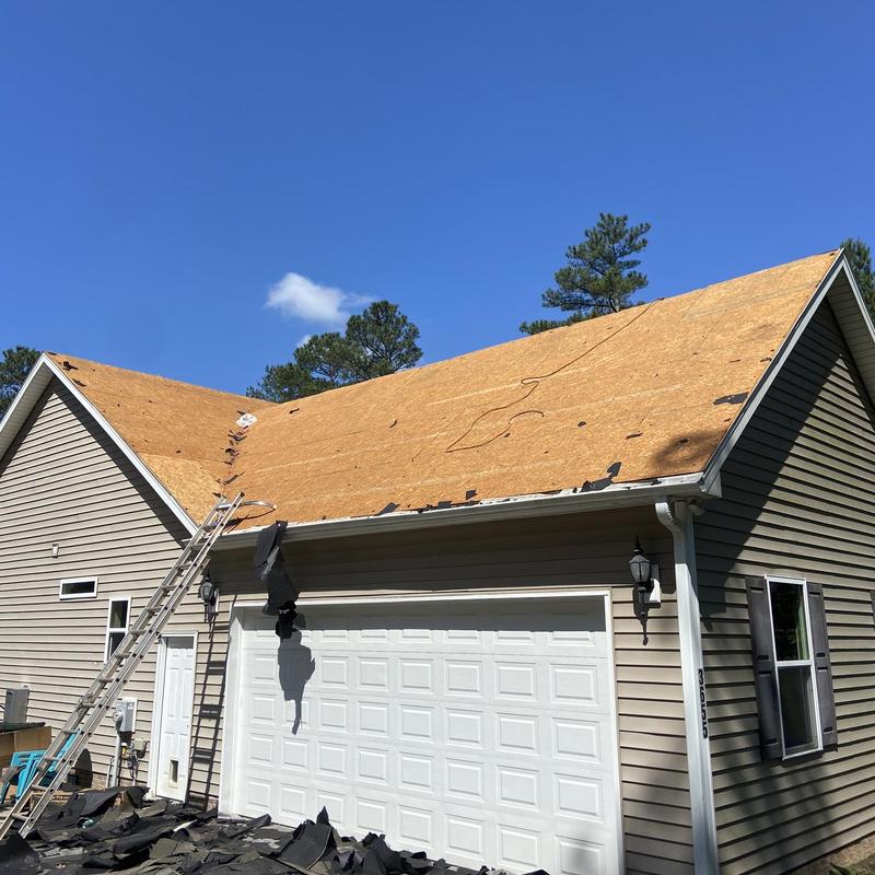 Roof decking installation on residential garage roof