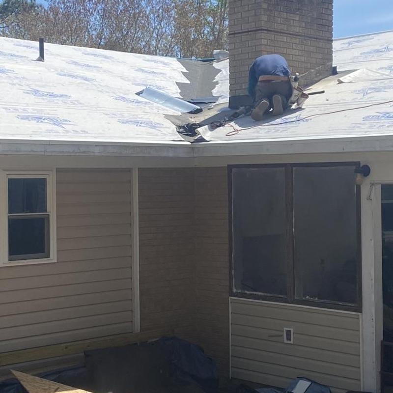 Roof underlayment installation around brick chimney Roof underlayment installation around brick chimney