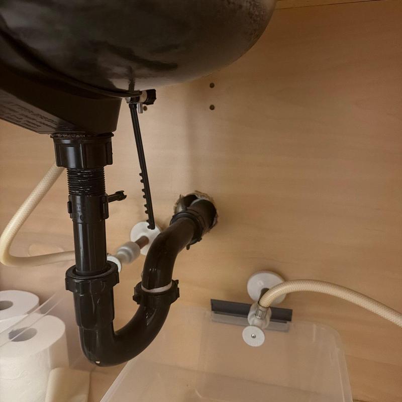 Plastic push-pull shutoff and water line under sink