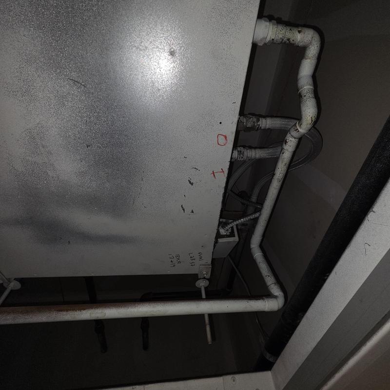 AC unit piping and connections inspection at Brookdale unit 220