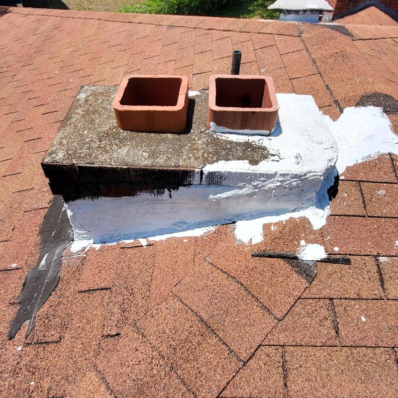 Chimney flashing and roof shingles with sealant