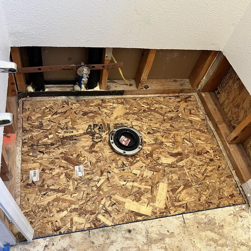 Toilet flange and subfloor installation in bathroom area