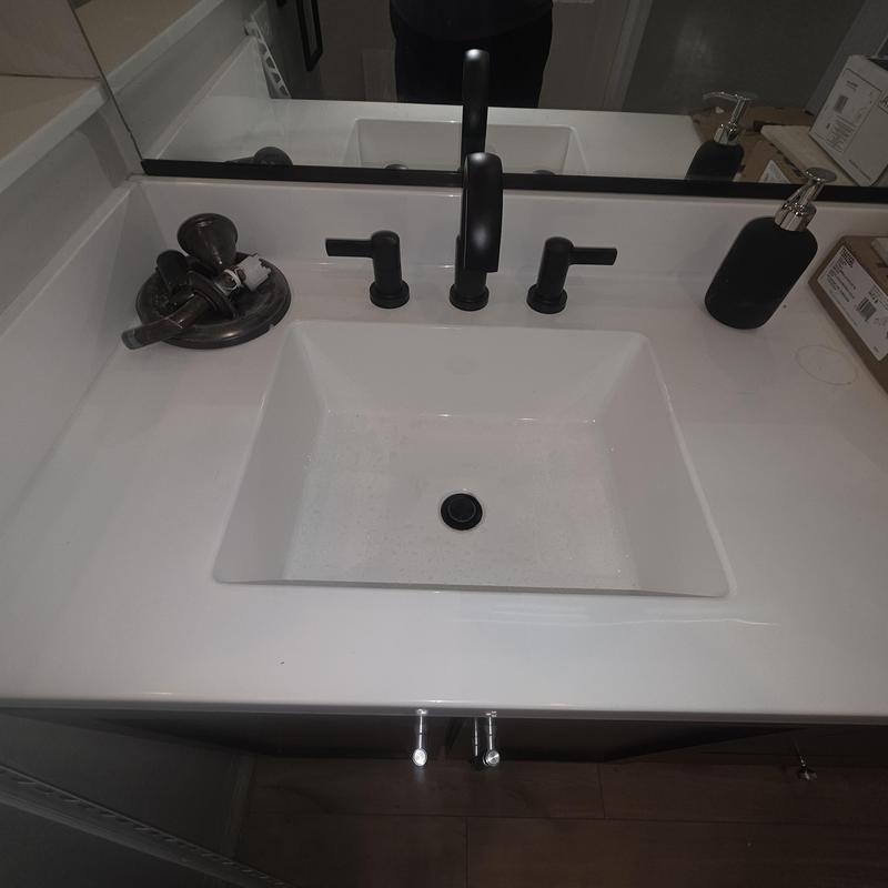 Matte black bathroom sink faucet and trim installation
