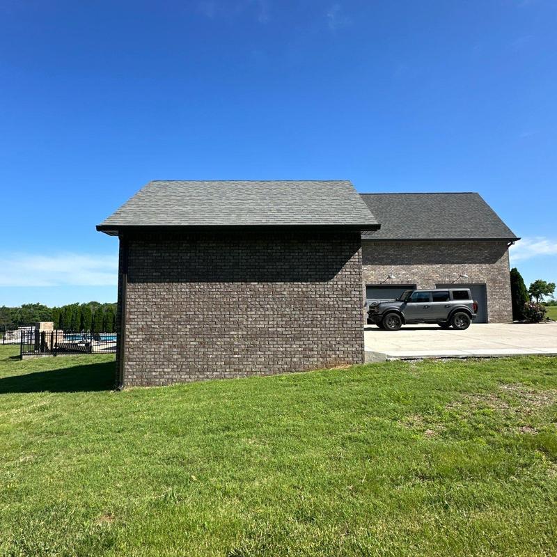 Asphalt shingle roof with hail damage inspection