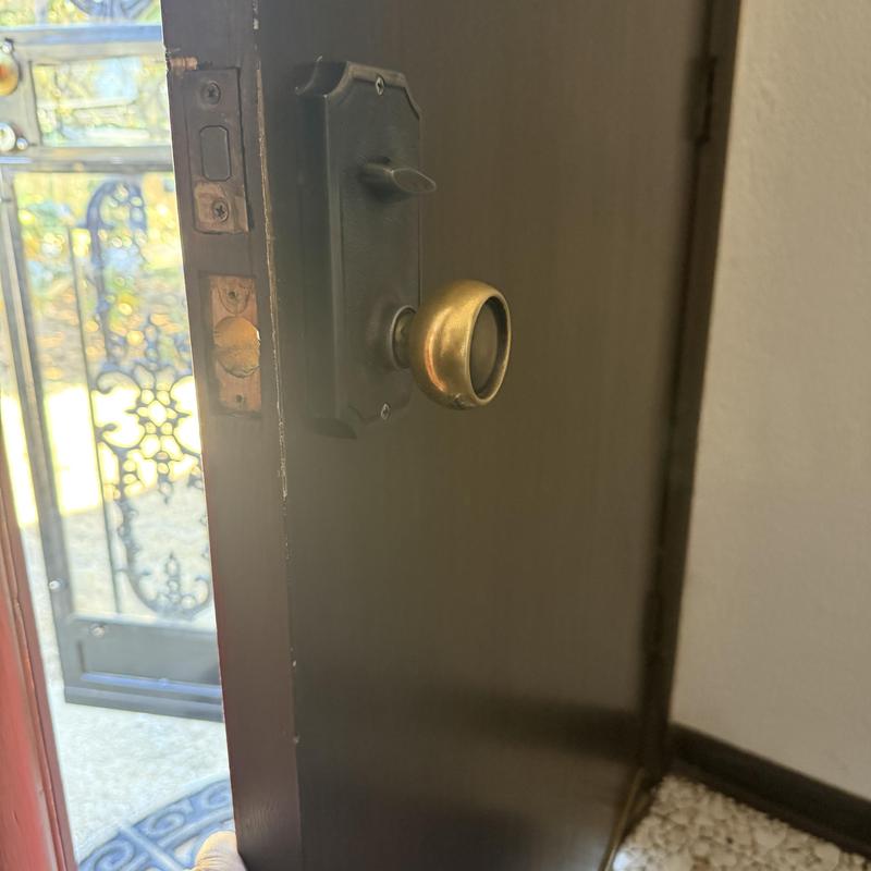 Door lock hardware with brass knob and wrap plate installation