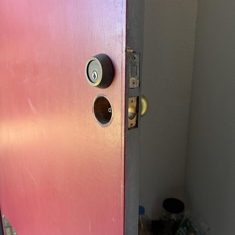 Entry lock and deadbolt removal on red door