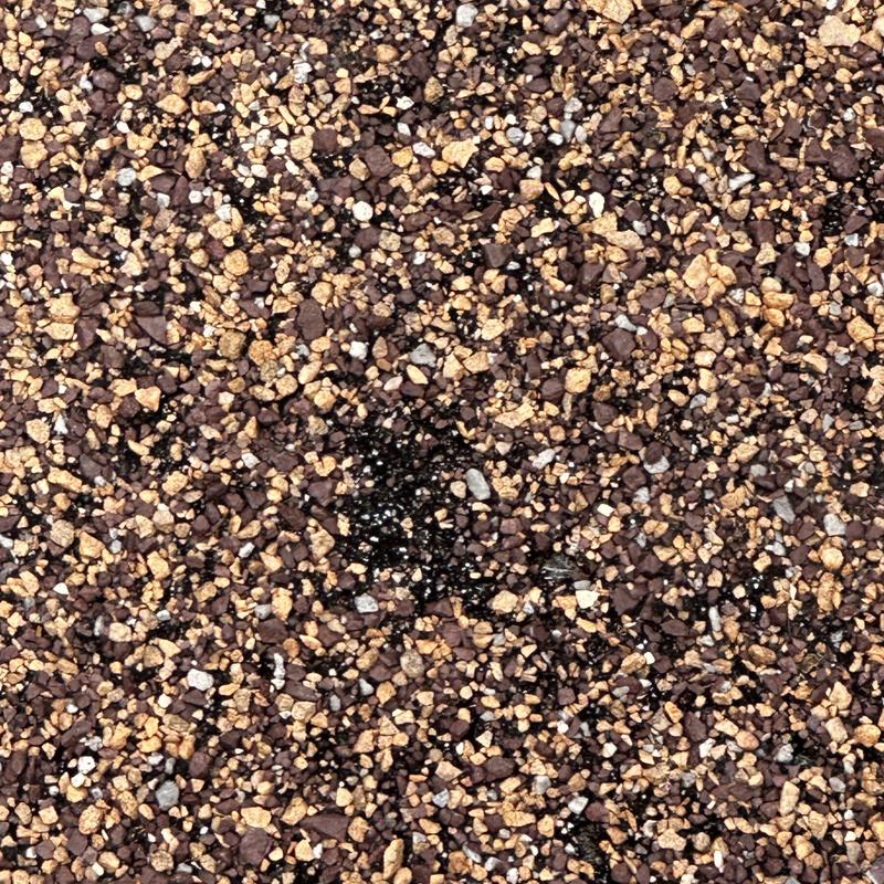 Asphalt shingle roof with hail damage granules