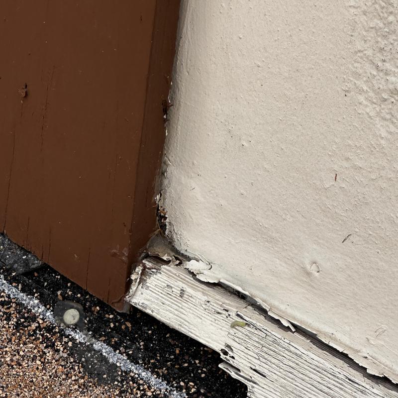 Roof edge wood with water and hail damage