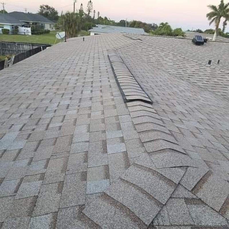 Shingle roof with new ridge cap installation in Cape Coral