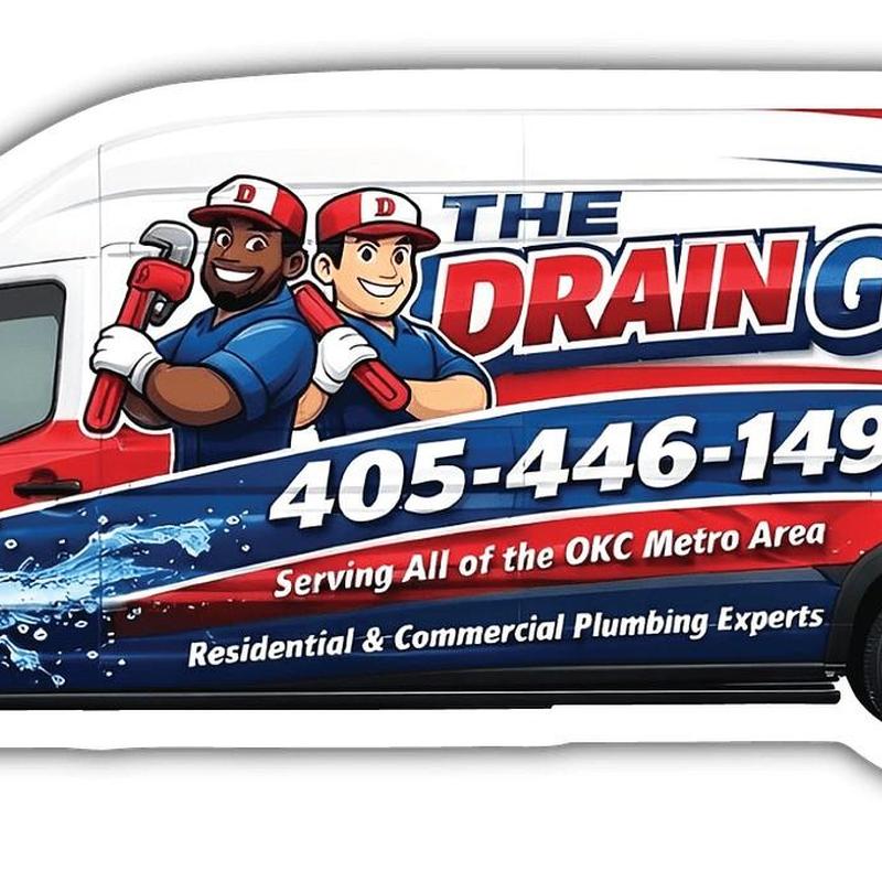 Wash machine drain with plumber van graphics and contact info
