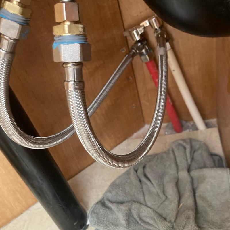 Kitchen shutoff valves with braided supply lines under sink Kitchen shutoff valves with braided supply lines under sink