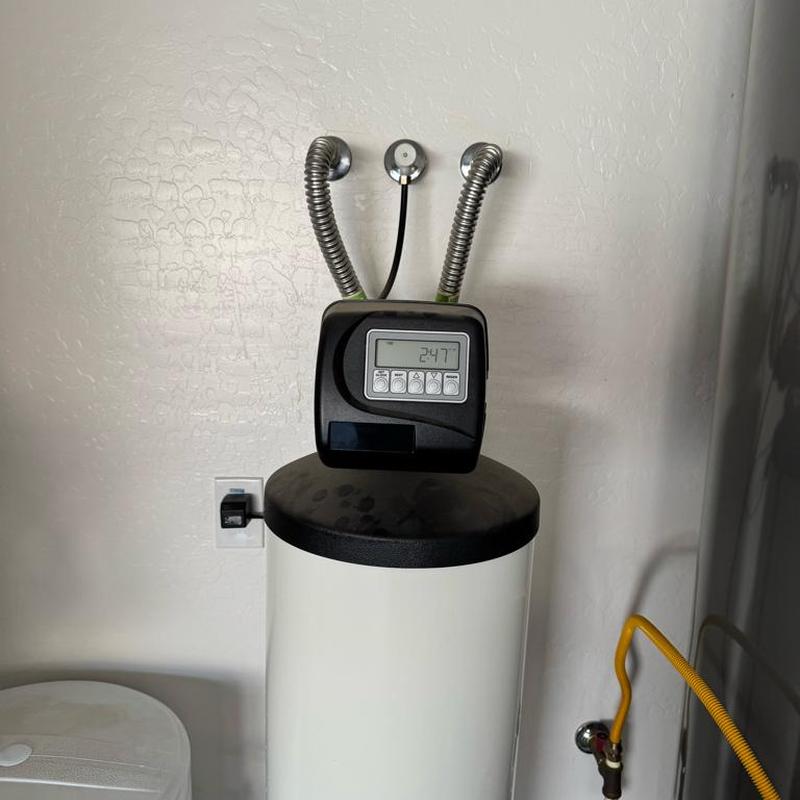Water softener with digital control display installed
