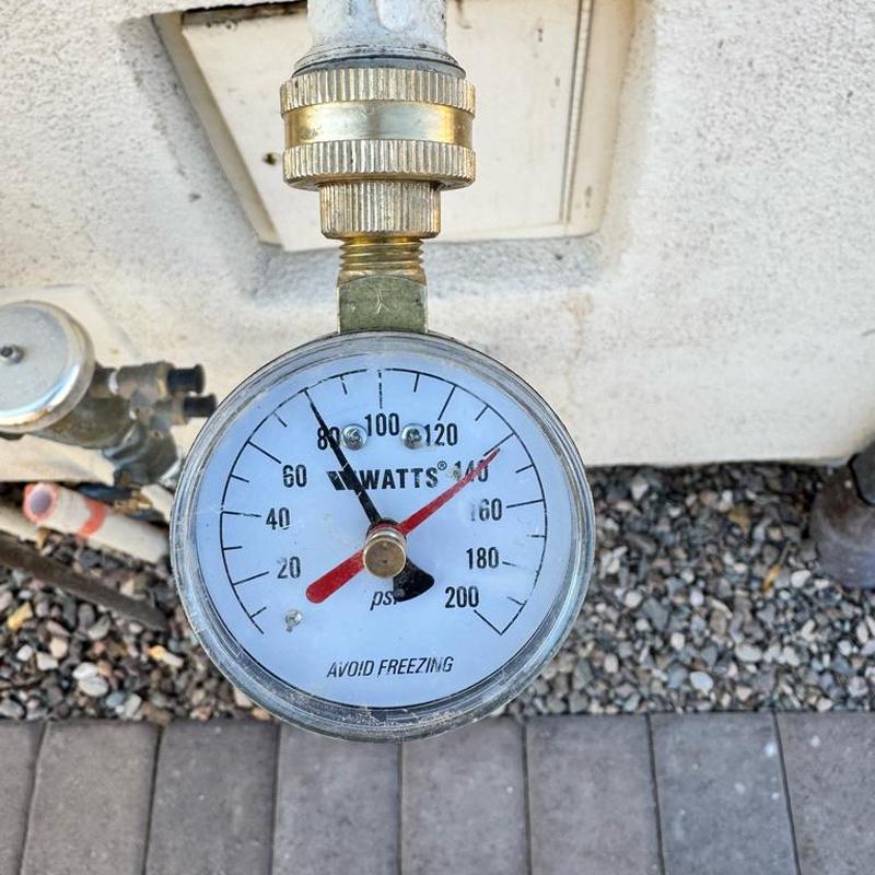 Pressure reducing valve gauge with irrigation pipes in Queen Creek