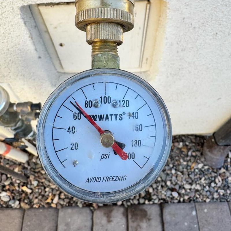 Pressure reducing valve gauge installed in irrigation system box