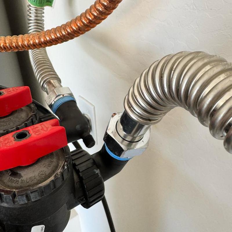 Water softener connections with flexible pipe fittings