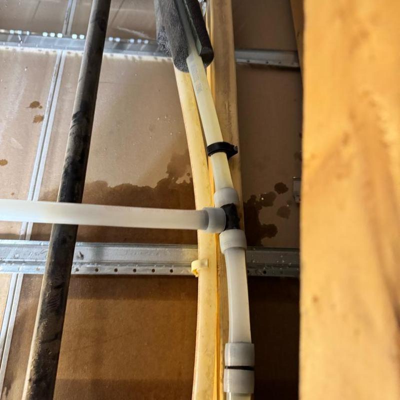 Water heater recirculation pump and mixing valve plumbing