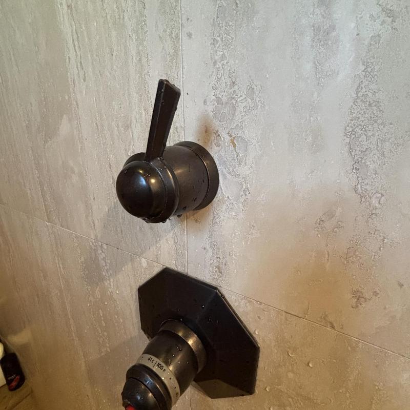 Moen shower cartridges installed in tile wall