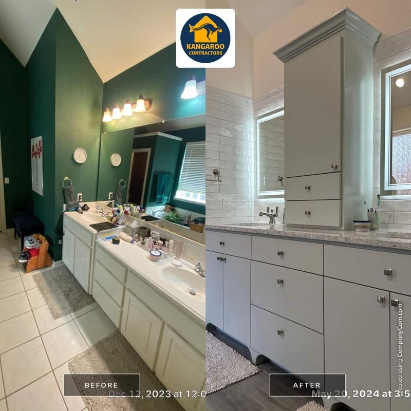 Bathroom vanity cabinets with new countertop and lighting