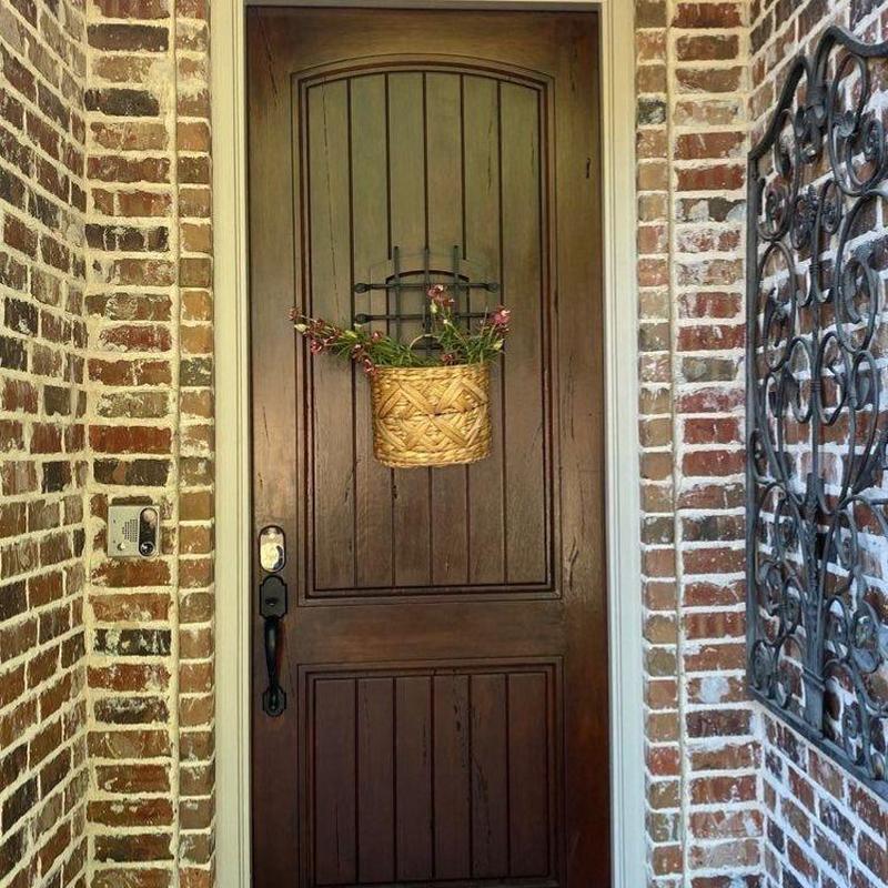 Wooden front door with hanging flower basket