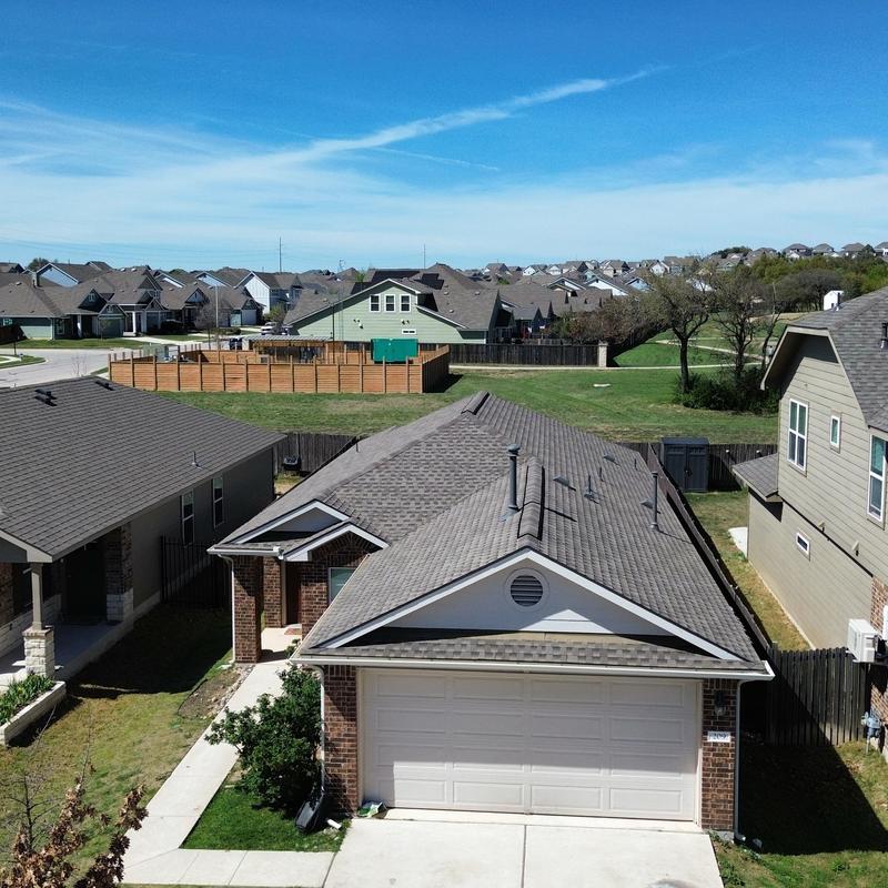 Asphalt shingle roof with ridge vent installation Asphalt shingle roof with ridge vent installation