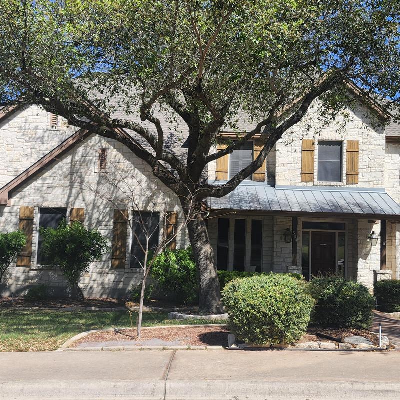 GAF lifetime warranty shingle roof on stone home GAF lifetime warranty shingle roof on stone home