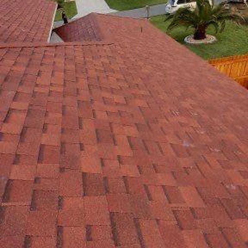 Red shingle roof on residential home in Cape Coral
