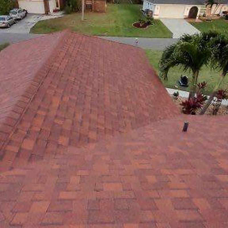 Shingle roof with new reddish-brown shingles in Cape Coral