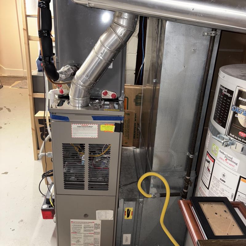 Ruud 95% gas furnace with ductwork and vent pipe Ruud 95% gas furnace with ductwork and vent pipe