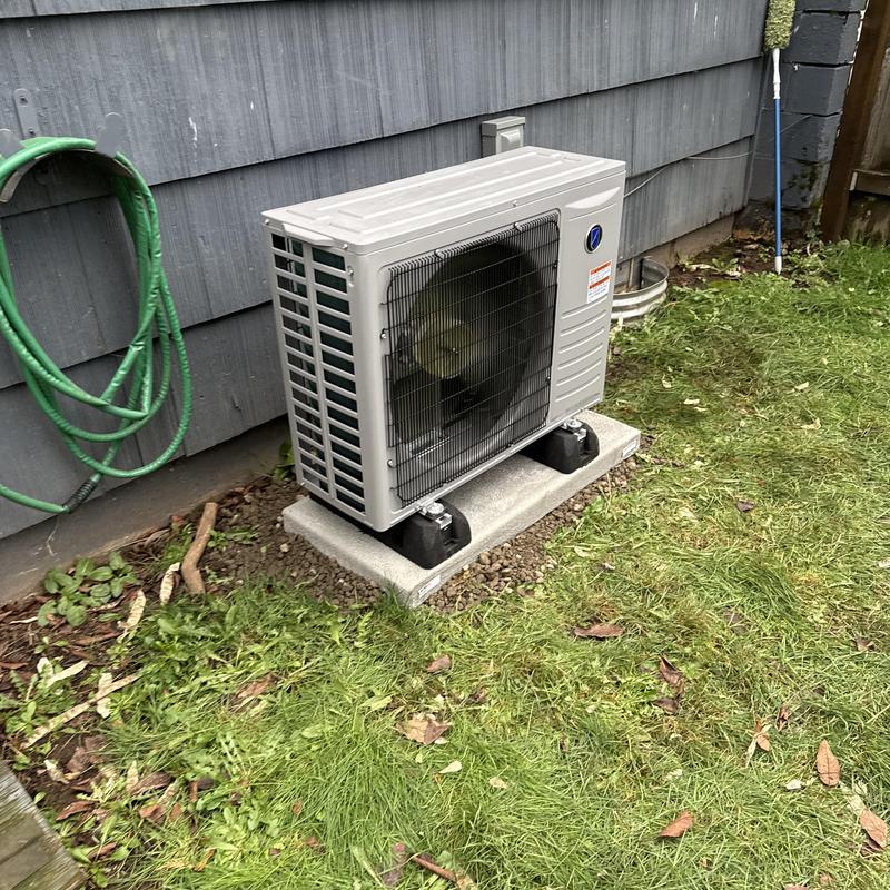 Friedrich heat pump unit installed on concrete pad Friedrich heat pump unit installed on concrete pad