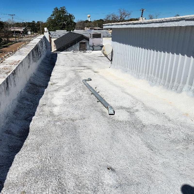 Fiber asphalt buildup roof with damage inspection