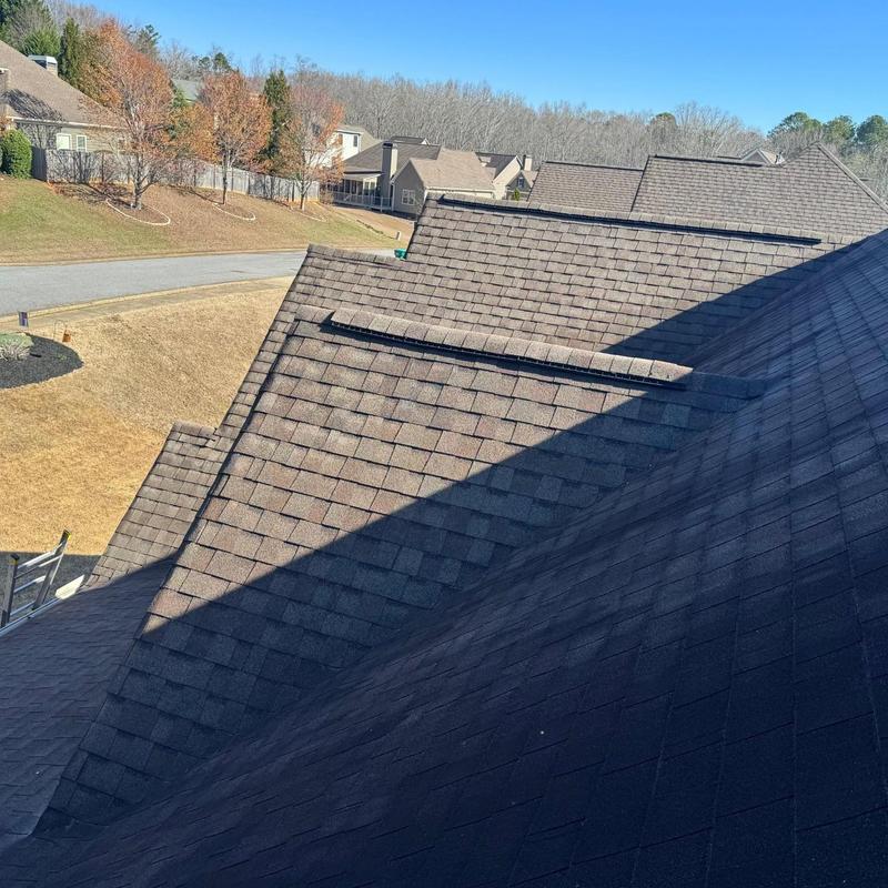 Asphalt shingle roof with loose shingles inspection