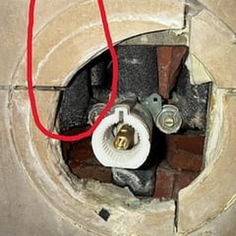 Shower valve hot water line with leak exposed