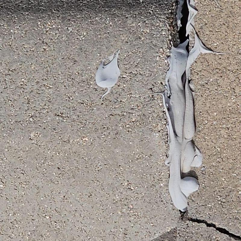 Tile roof ridge connector sealing with white caulk Tile roof ridge connector sealing with white caulk