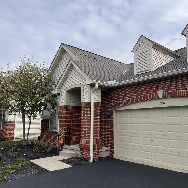 Asphalt shingle roofing with ventilation repairs on house Asphalt shingle roofing with ventilation repairs on house