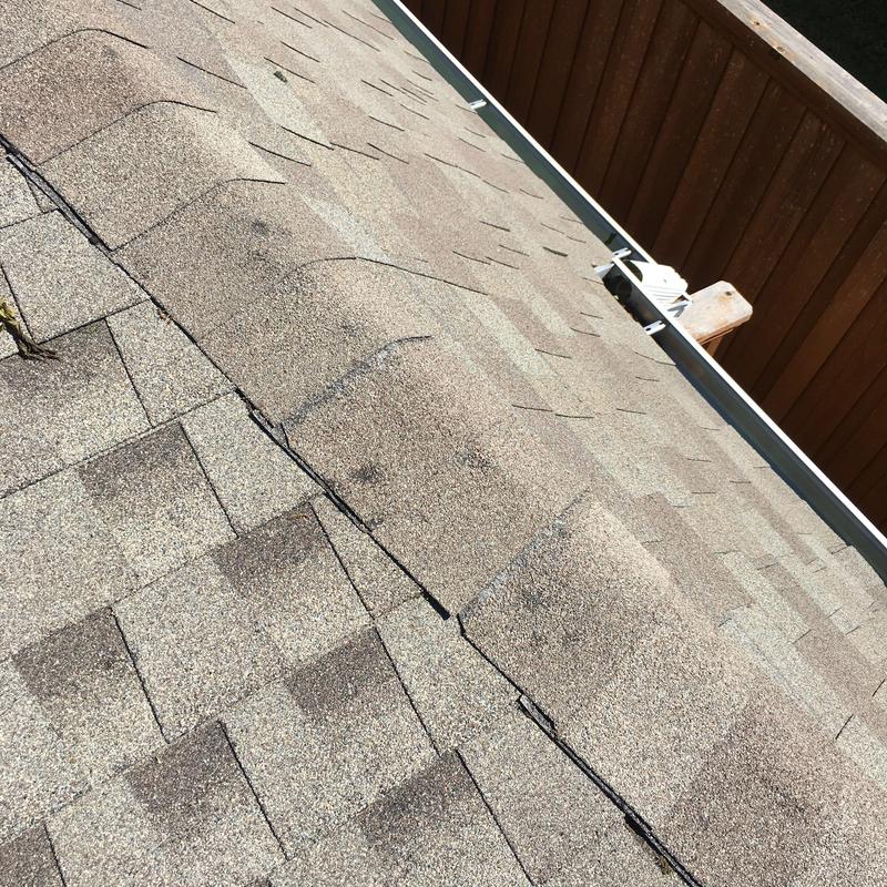 GAF Timberline HD roof shingles with ridge caps and gutter GAF Timberline HD roof shingles with ridge caps and gutter