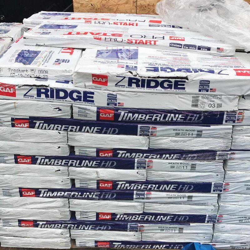 GAF Timberline HD roofing shingles stacked for installation GAF Timberline HD roofing shingles stacked for installation