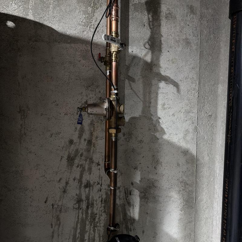 Main water line with pressure reducer and valves