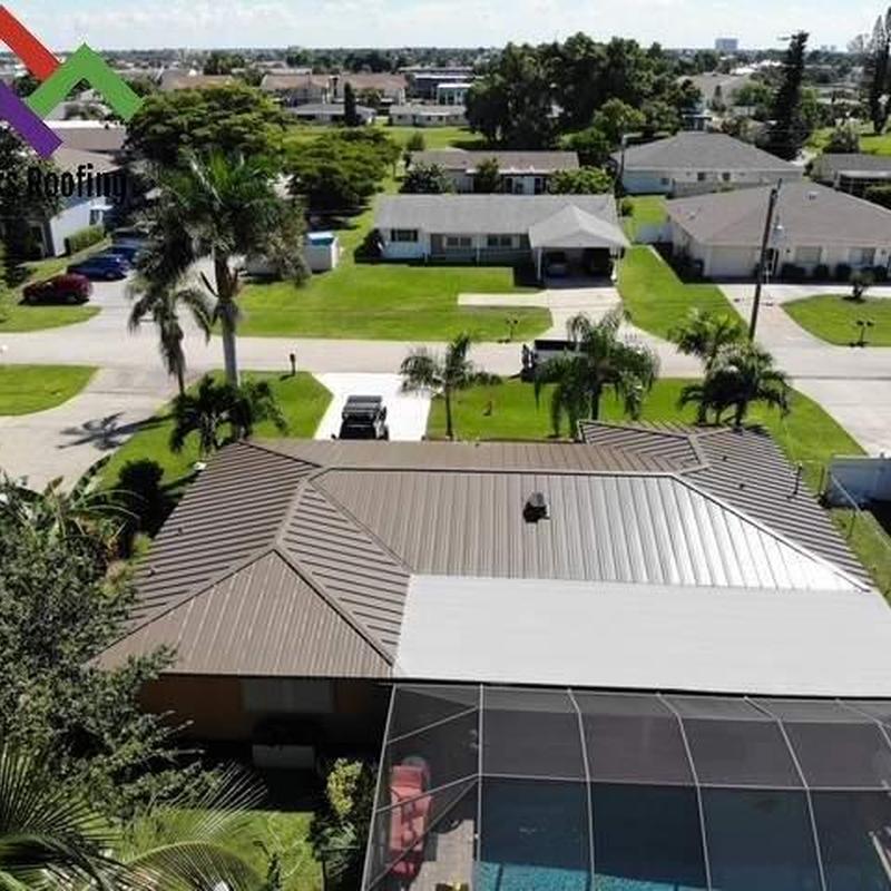 Standing seam metal roof with Polyglass flat roof