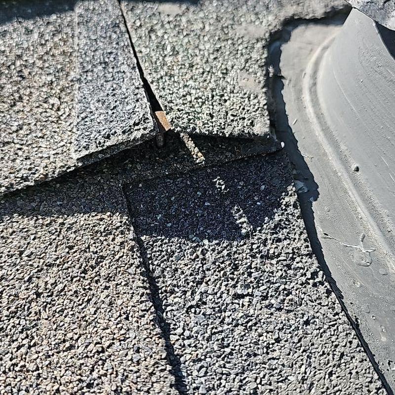 Asphalt shingles lifting near roof vent flashing sealant Asphalt shingles lifting near roof vent flashing sealant