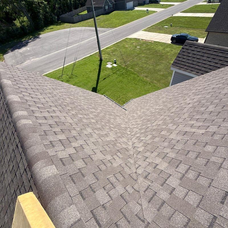 Asphalt shingle roof surface with hail damage inspection