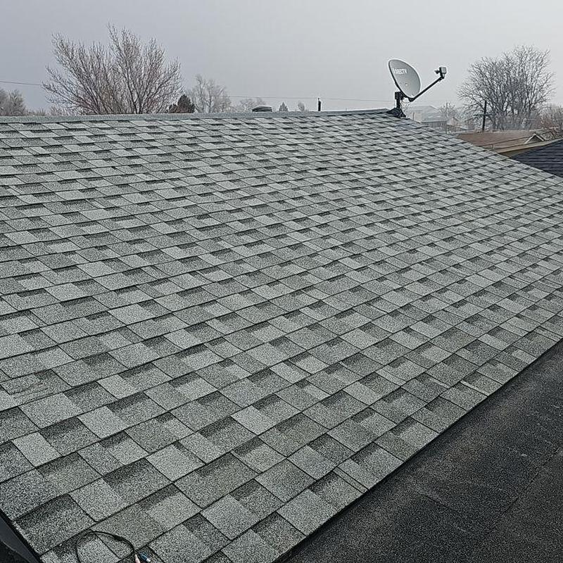 Shingle roof with sealed pipe jacks and satellite dish Shingle roof with sealed pipe jacks and satellite dish