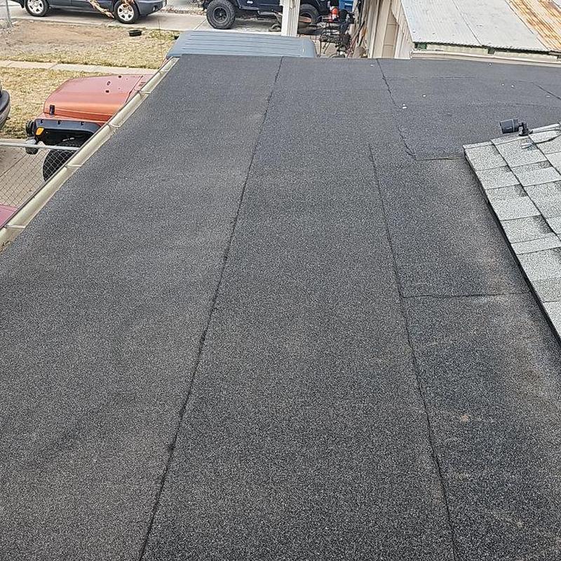 Flat shingle roof with resealed pipe jacks Flat shingle roof with resealed pipe jacks