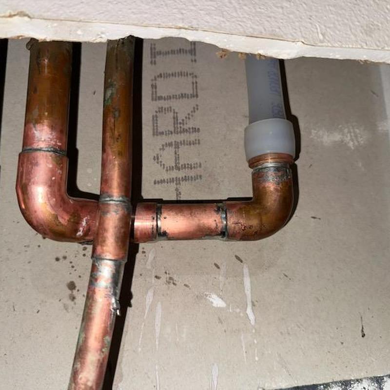 Copper and PEX water piping reroute in attic ceiling