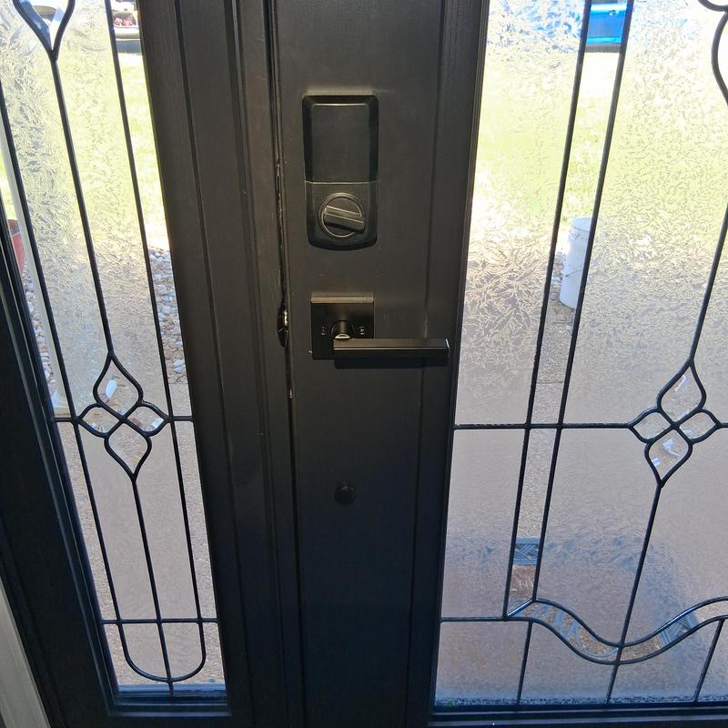 Smart key lock set installed on decorative glass door